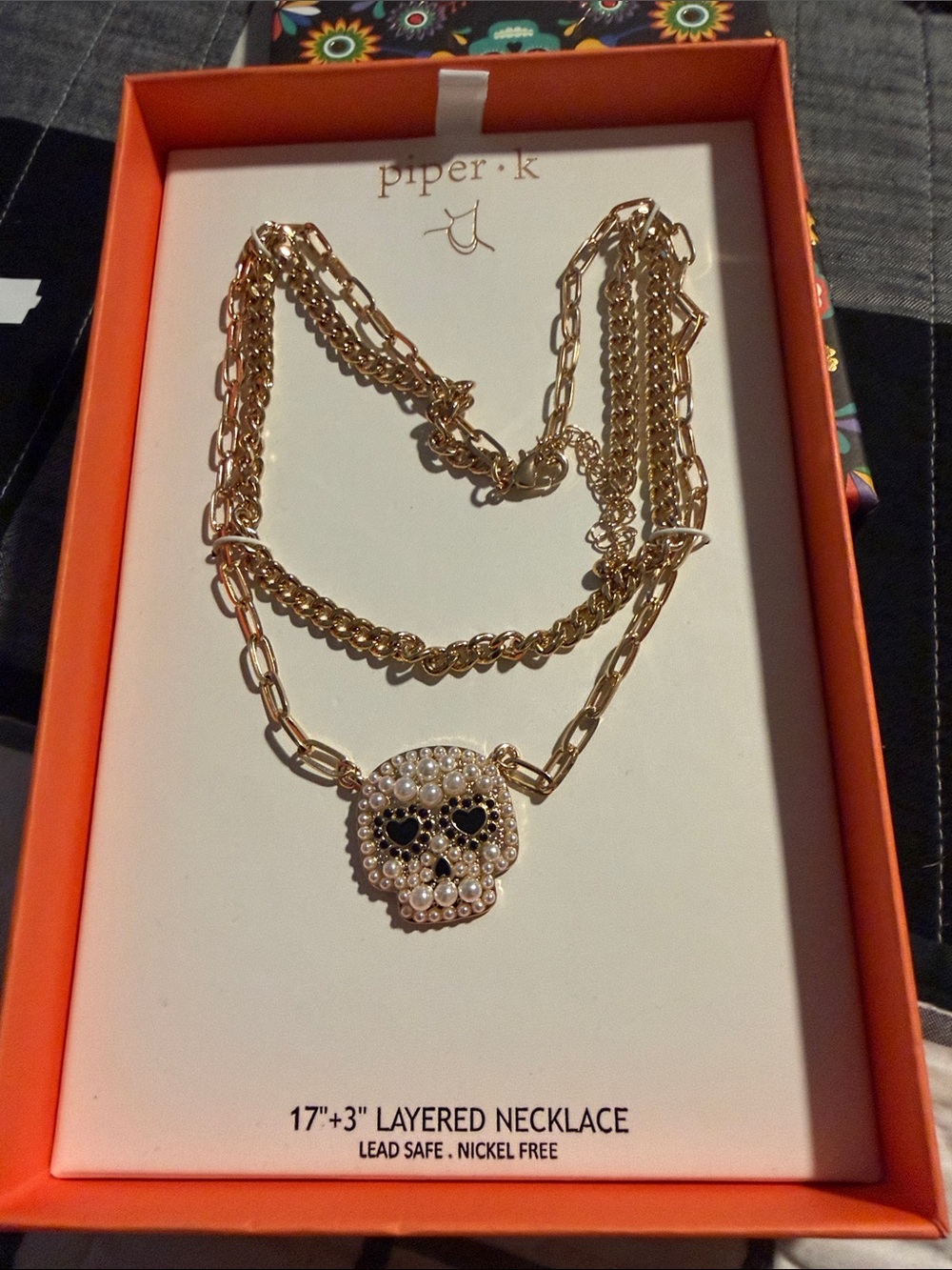 Piper Gold Layered Skull Necklace with Pearl Accents and Black Eye Details